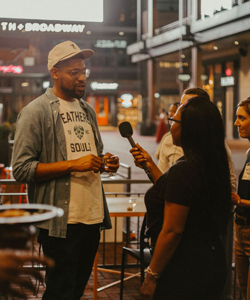 man being interviewed for documentary