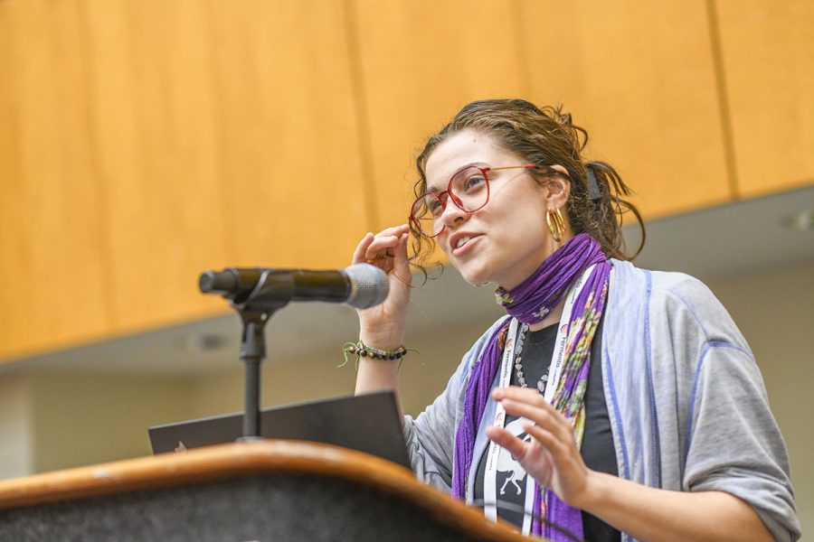 speaker giving presentation at conference