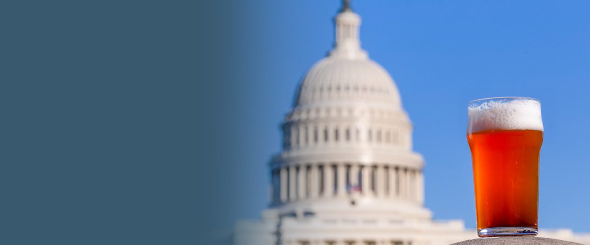 United states capitol with a beer in front of it