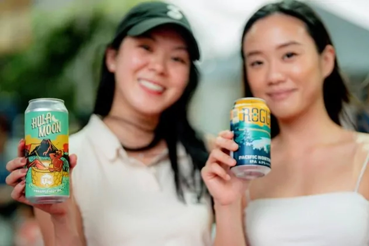 Two women with American Craft beer cans