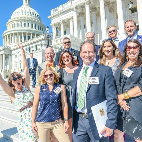 Hill climb attendees on the steps of the U.S. Capitol.