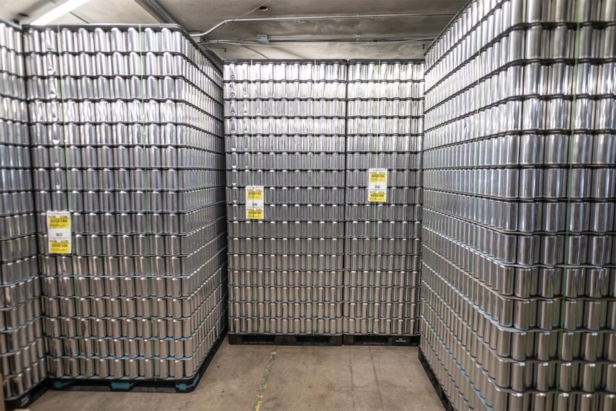 Stacks of unprinted cans in warehouse