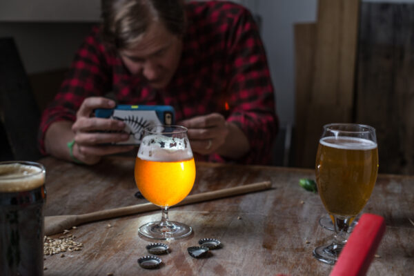 photgrapher taking a picture of beer