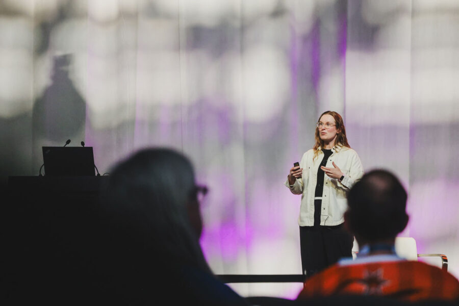 Artsy shot of a woman speaking at the 2026 Craft Brewers Conference