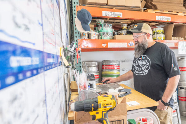 A craft brewer on a computer