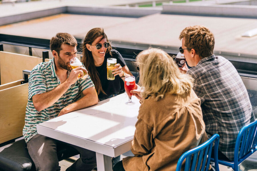 Taproom patrons enjoying beer outside