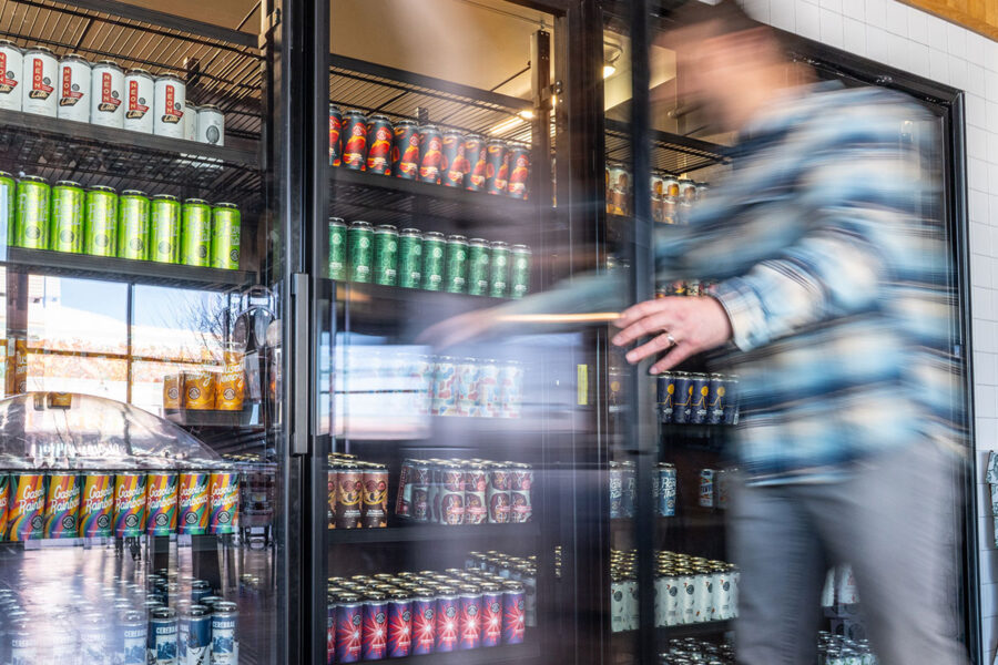 man buying craft beer