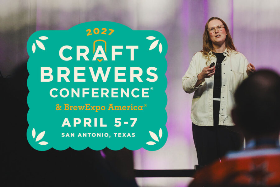 A woman speaking at the craft brewers conference.