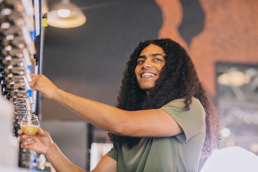 taproom staff pouring beer